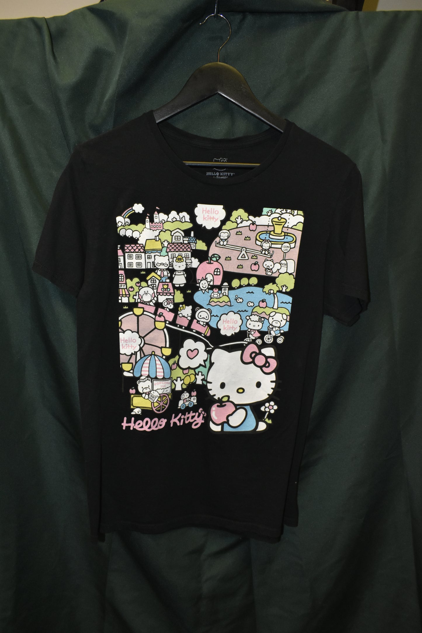 PREOWNED CARTOON SHIRT MEDIUM HELLO KITTY TOWN