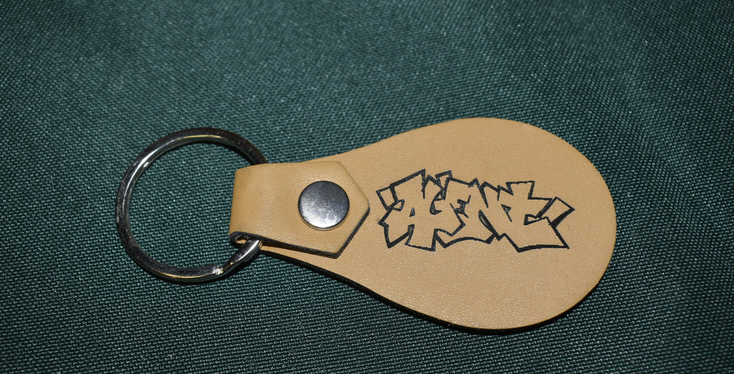 AGENT KEYCHAIN LEATHER BURNED TAGGED
