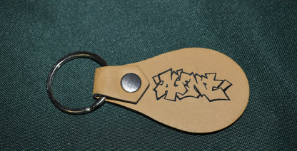 AGENT KEYCHAIN LEATHER BURNED TAGGED