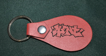 AGENT KEYCHAIN LEATHER BURNED TAGGED