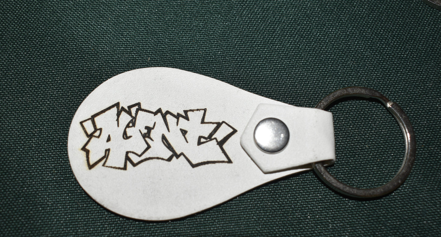 AGENT KEYCHAIN LEATHER BURNED TAGGED