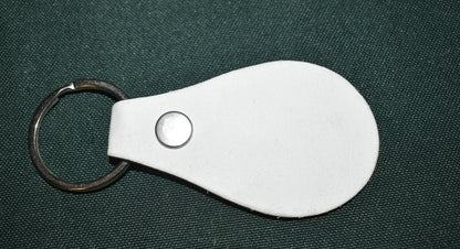 AGENT KEYCHAIN LEATHER BURNED TAGGED